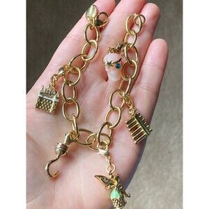 Disney gold tone Peter Pan charm bracelet